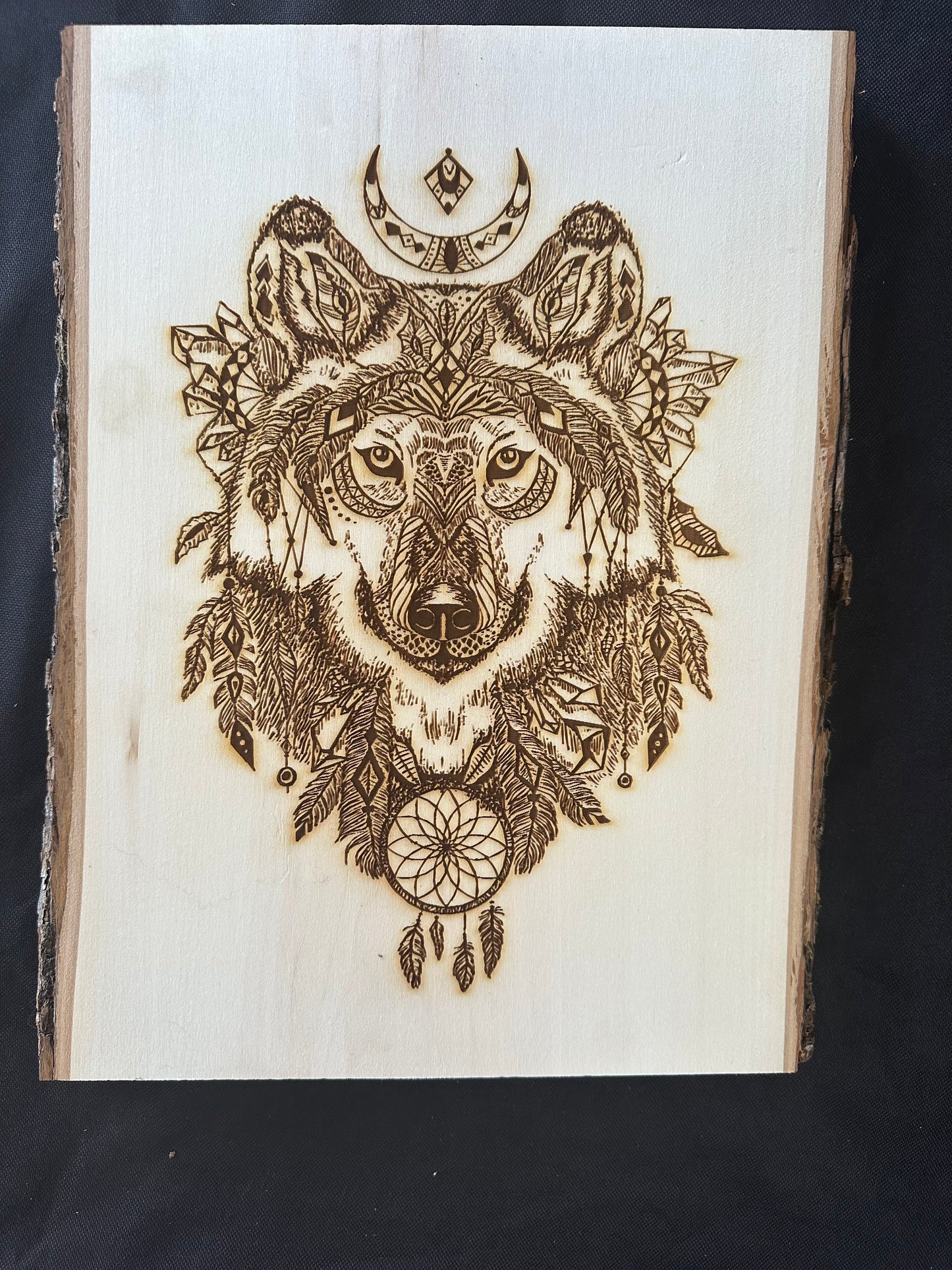 Wall Art -  laser etched on live-edge basswood Wolf Mandela