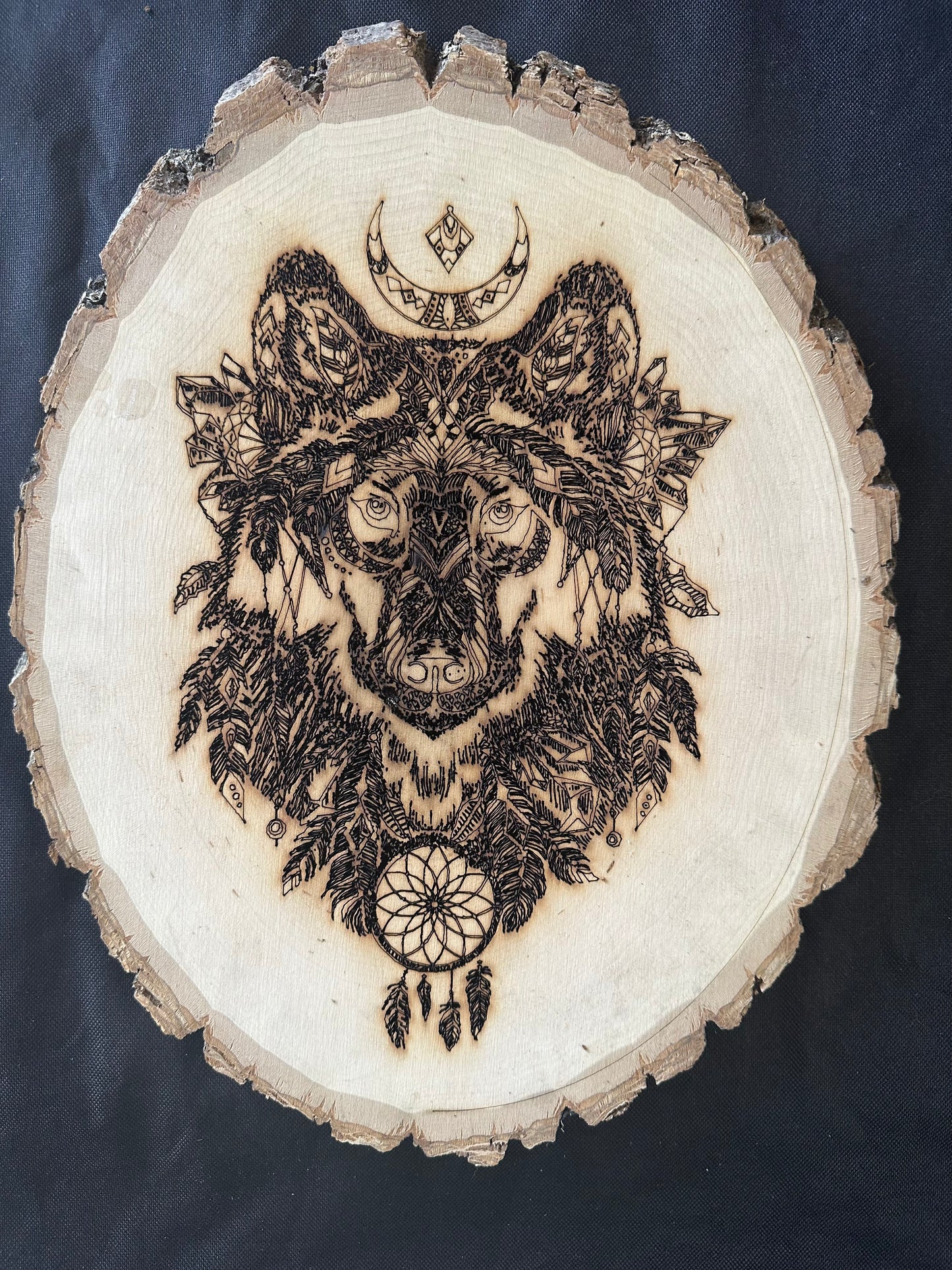Wall Art -  laser etched on live-edge basswood Wolf Mandela