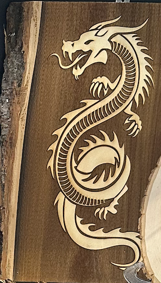 Wall Art -  laser etched on live-edge basswood Chinese Dragon (reverse burn, vertical Left)
